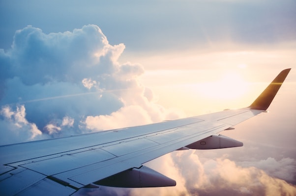 view of plane wing from inside the plane cabin